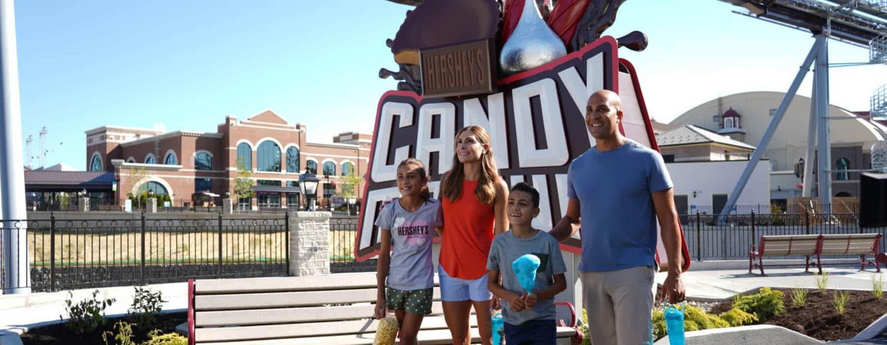 family in front of candymonium